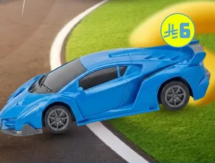 A blue toy car designed for racing on tracks.
