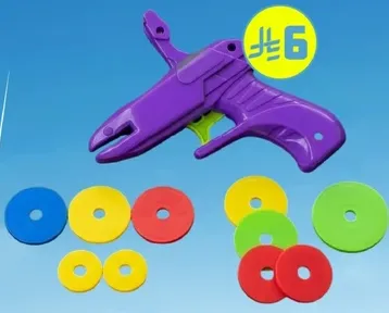 A colorful toy gun with six discs in various colors for fun play.